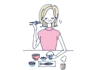 ヘルシーなランチを食べてる女性