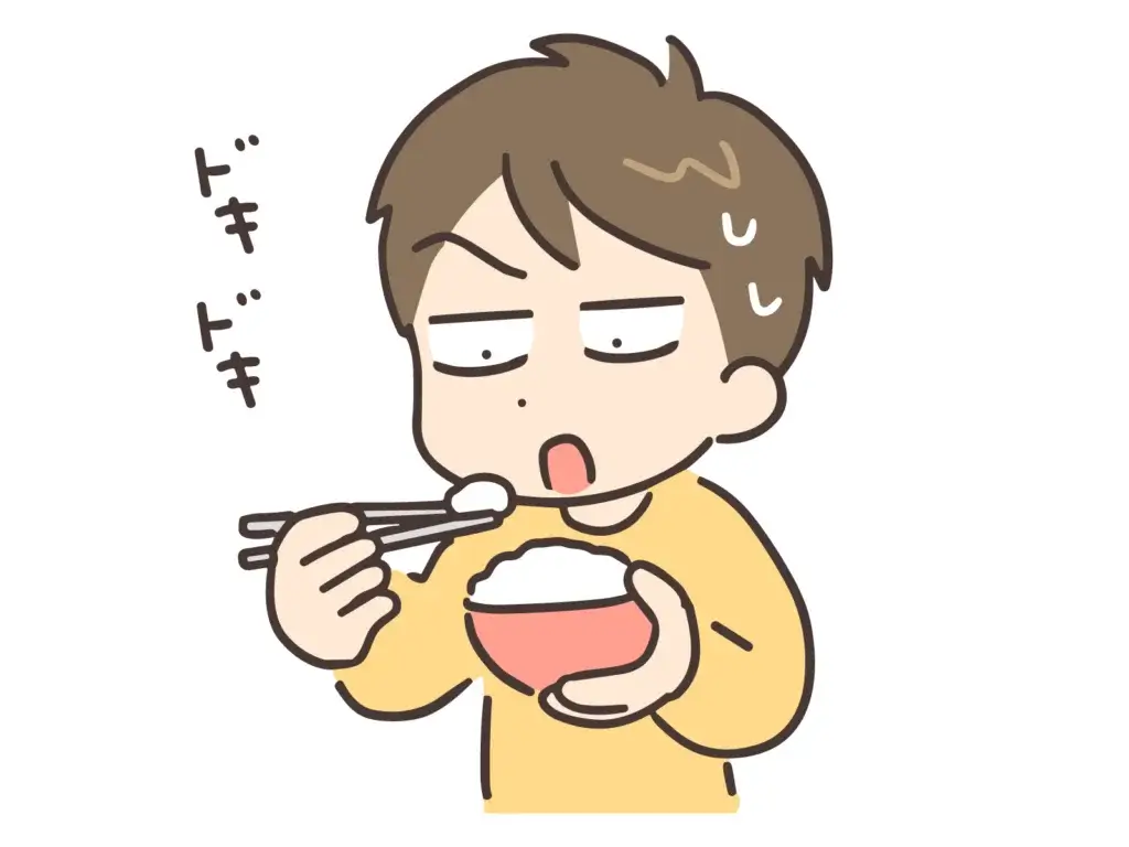 ドキドキしながらご飯を食べている人